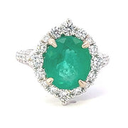 14K White Gold Emerald and Diamond Halo Ring